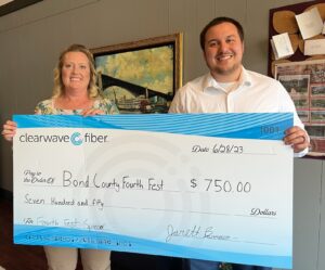 Clearwave Fiber donates $750 to Bond County Fourth Fest.