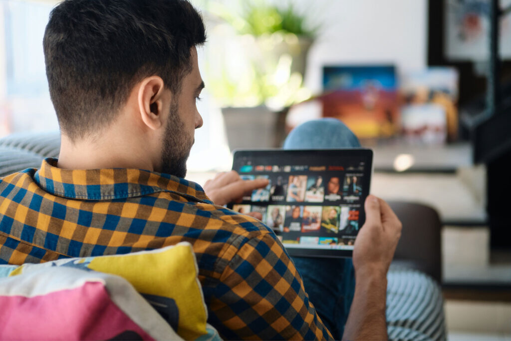 Man streaming using fiber-optic internet