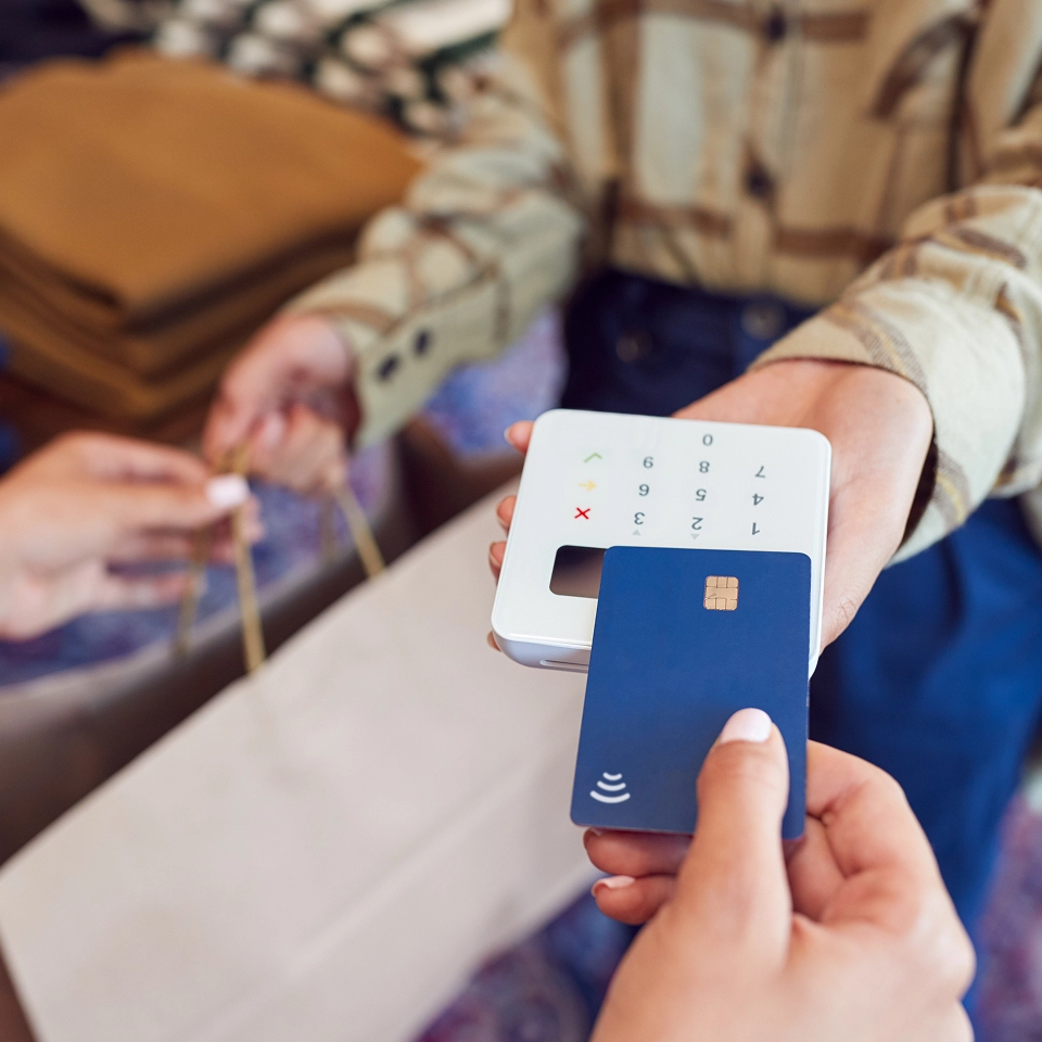 Shopper paying with tap-to-pay.